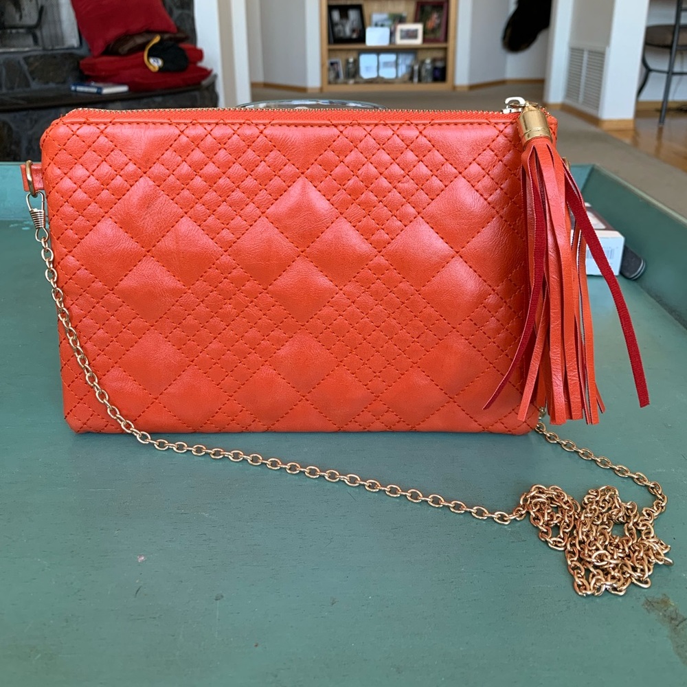Bright orange cross body or wrist purse